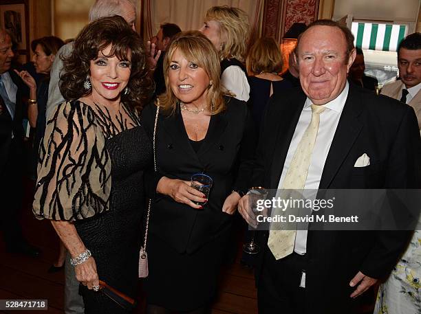 Dame Joan Collins, Eve Pollard and Andrew Neil attend the launch of Dame Joan Collins' new book "The St. Tropez Lonely Hearts Club" at Harry's Bar on...