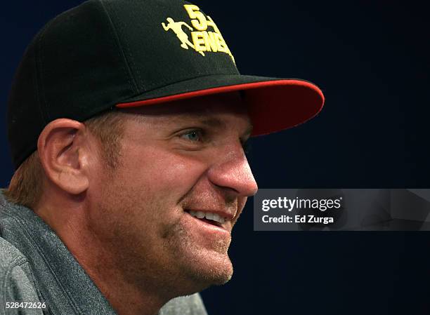 Clint Bowyer, driver of the 5-Hour Energy Chevrolet, talks to the media prior to a practice sessions for the Toyota Tundra 250 at Kansas Speedway on...