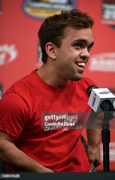 Rico Abreu, driver of the Safelite Toyota, talks to the media prior to a practice sessions for the Toyota Tundra 250 at Kansas Speedway on May 5,...