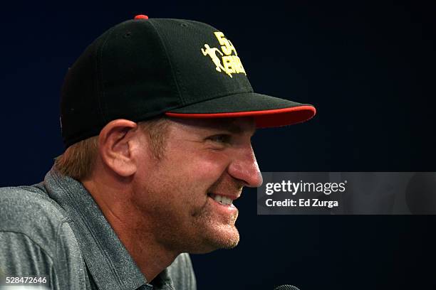 Clint Bowyer, driver of the 5-Hour Energy Chevrolet, talks to the media prior to a practice sessions for the Toyota Tundra 250 at Kansas Speedway on...