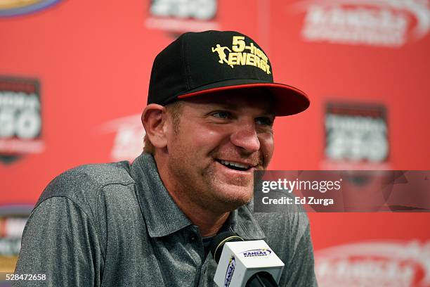 Clint Bowyer, driver of the 5-Hour Energy Chevrolet, talks to the media prior to a practice sessions for the Toyota Tundra 250 at Kansas Speedway on...