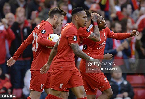 Liverpool's English striker Daniel Sturridge celebrates after an own goal by Villarreal's midfielder Bruno Soriano during the UEFA Europa League...