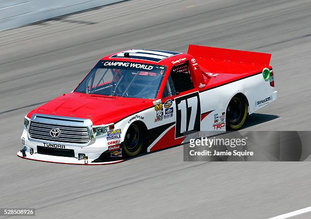 Timothy Peters, driver of the Red Horse Racing Toyota, practices for the NASCAR Camping World Truck Series 16th Annual Toyota Tundra 250 on May 05,...