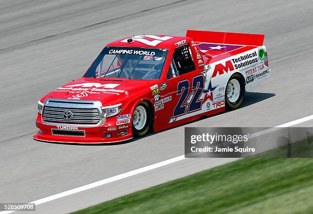 Austin Wayne Self, driver of the AM Technical Solutions Toyota, practices for the NASCAR Camping World Truck Series 16th Annual Toyota Tundra 250 on...