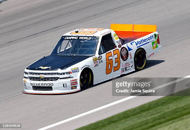 Bobby Pierce, driver of the Champion Oil/Vatterott College Chevrolet, practices for the NASCAR Camping World Truck Series 16th Annual Toyota Tundra...