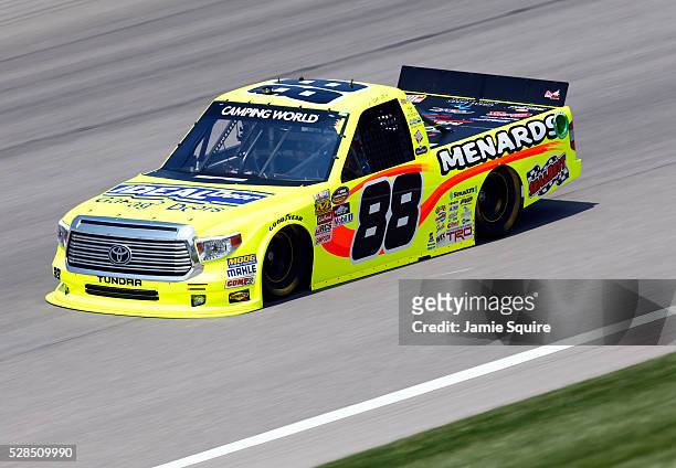 Matt Crafton, driver of the IdealDoor/Menards Toyota, practices for the NASCAR Camping World Truck Series 16th Annual Toyota Tundra 250 on May 05,...