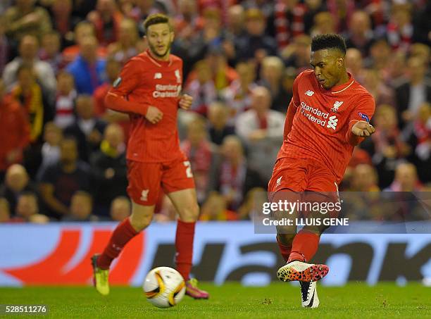 Liverpool's English striker Daniel Sturridge scores his team's second goal during the UEFA Europa League semi-final second leg football match between...