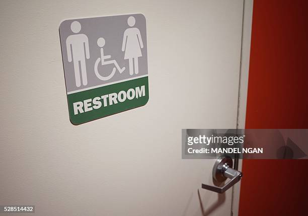 Gender neutral bathroom is seen at a restaurant in Washington, DC, on May 5, 2016. A heated national debate over access to bathrooms by transgenders...