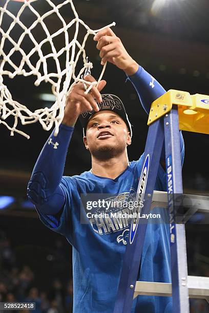 Derrick Gordon of the Seton Hall Pirates cuts the nets after winning the Big East Men's Tournament Championship game against the Villanova Wildcats...