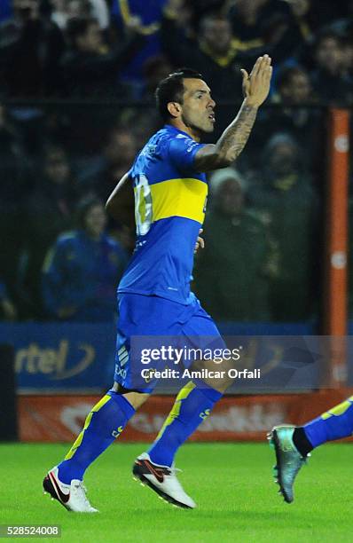 Carlos Tevez of Boca Juniors celebrates after scoring the first goal of his team by a penalty kick during a second leg match between Boca Juniors and...