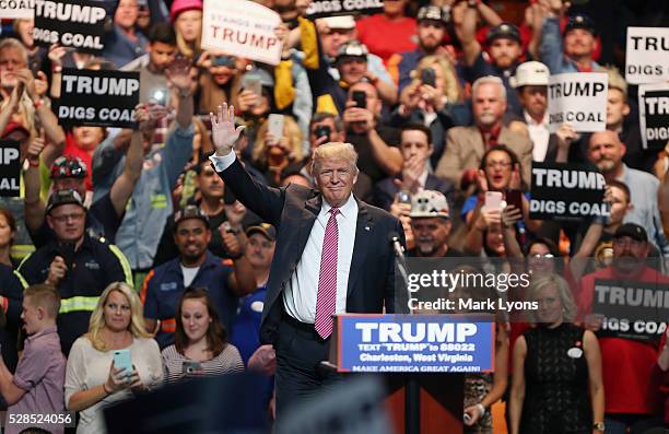 Republican Presidential candidate Donald Trump waves to the crowd as he arrives for his rally at the Charleston Civic Center on May 5, 2016 in...