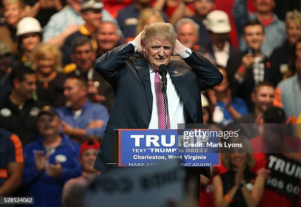 Republican Presidential candidate Donald Trump plays with his hair during his rally at the Charleston Civic Center on May 5, 2016 in Charleston, West...