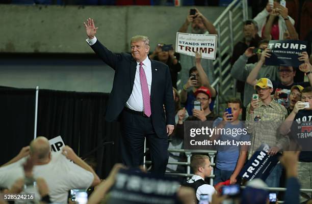 Republican Presidential candidate Donald Trump waves as he arrives at his rally at the Charleston Civic Center on May 5, 2016 in Charleston, West...