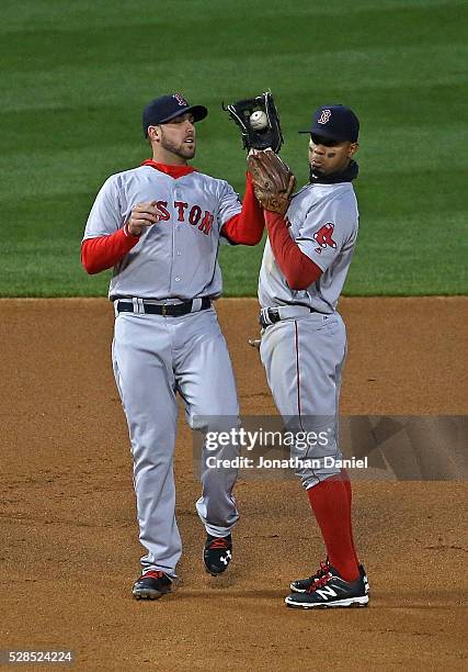 Travis Shaw of the Boston Red Sox makes a catch as Xander Bogaerts avoids the collision against the Chicago White Sox in the 2nd inning at U.S....