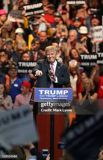 Republican Presidential candidate Donald Trump points to his supporters as he arrives for his rally at the Charleston Civic Center on May 5, 2016 in...