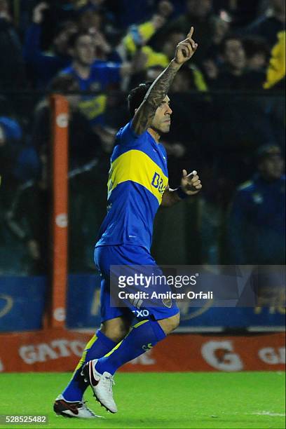 Carlos Tevez of Boca Juniors celebrates after scoring the first goal of his team by a penalty kick during a second leg match between Boca Juniors and...