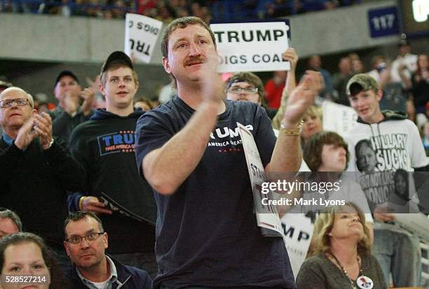 Supporters for United States Republican Presidential candidate Donald Trump as they wait for him to arrive to his rally at the Charleston Civic...