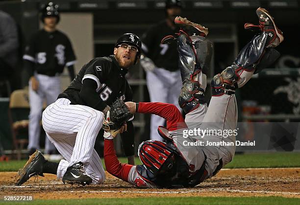 Ryan Hanigan of the Boston Red Sox ends up on his back after tagging out Brett Lawrie of the Chicago White Sox to end the 5th inning at U.S. Cellular...