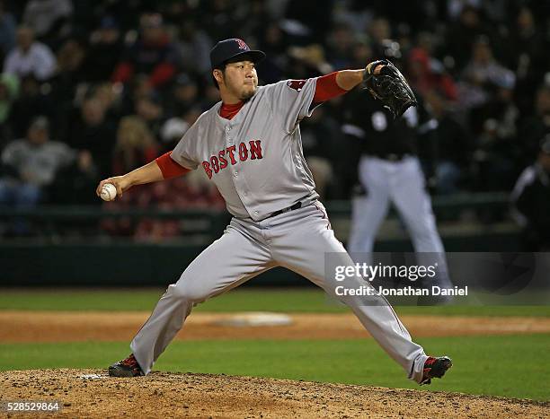 Junichi Tazawa of the Boston Red Sox pitches in the 7th inning against the Chicago White Sox at U.S. Cellular Field on May 5, 2016 in Chicago,...