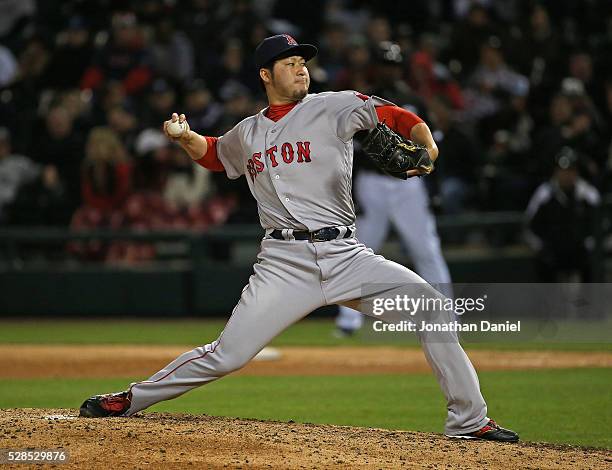 Junichi Tazawa of the Boston Red Sox pitches in the 7th inning against the Chicago White Sox at U.S. Cellular Field on May 5, 2016 in Chicago,...