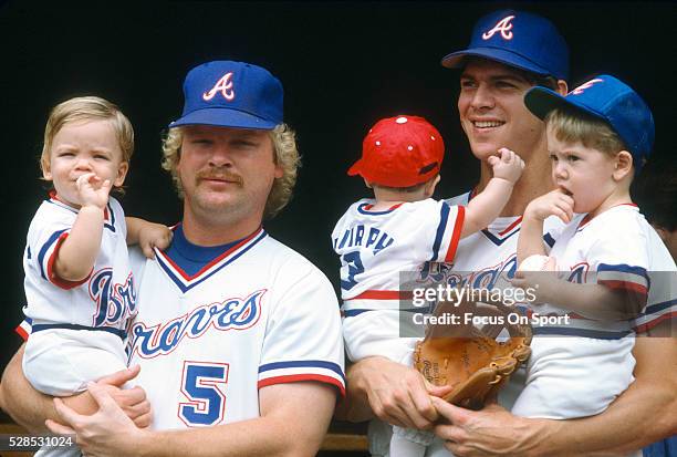 Bob Horner and Dale Murphy of the Atlanta Braves holds their kids in their arms prior to the start of Major League Baseball game circa 1982 at...