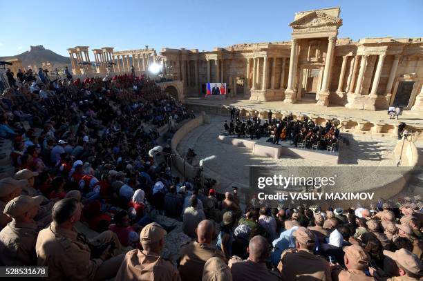 Russian conductor Valery Gergiev leads a concert in the amphitheatre of the ancient city of Palmyra on May 5, 2016.