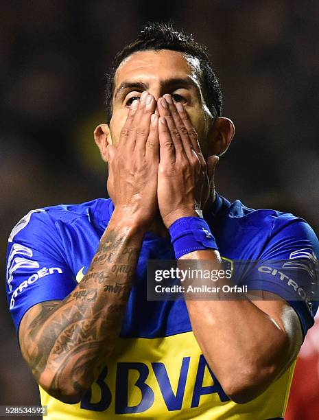 Carlos Alberto Tevez of Boca Juniors gestures during a second leg match between Boca Juniors and Cerro Porteno as part of round of sixteen of Copa...