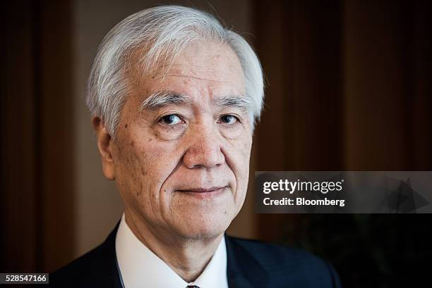 Hiroshi Watanabe, governor of the Japan Bank for International Cooperation , poses for a photograph before delivering a special lecture at Austria's...