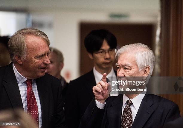 Hiroshi Watanabe, governor of the Japan Bank for International Cooperation , right, attends a special lecture at Austria's central bank, also known...