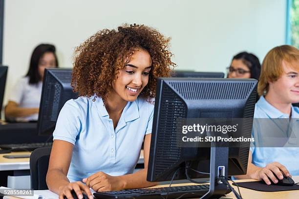 diverse students in private school computer class - beautiful ethiopian girls stockfoto's en -beelden