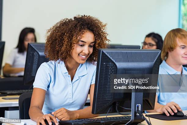 diverse students in private school computer class - african american school uniform stock pictures, royalty-free photos & images