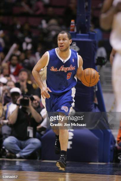 Rick Brunson of the Los Angeles Clippers drives up court against the New Jersey Nets during their game on March 30, 2005 at Continental Airlines...