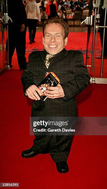 Warwick Davis attends the UK Premiere of "Star Wars Episode III: Revenge Of The Sith" at Odeon Leicester Square on May 16, 2005 in London. The...