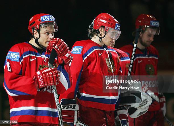 Denis Denisov and Maxim Afinogenov of Russia react after losing to Canada in the IIHF World Men's Championships semi-final game at Wiener Stadthalle...