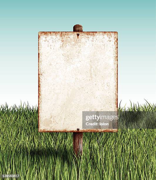 stockillustraties, clipart, cartoons en iconen met weathered blank placard with wooden post and grass field - wooden sign post