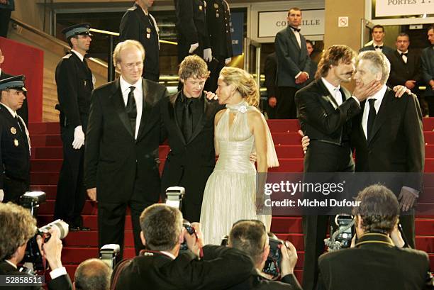 William Hurt, Ashton Holmes, Maria Bello, Viggo Mortensen and David Cronenberg pose on the red stairs, attend the preview of "A History of Violence",...