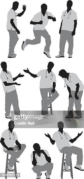 male nurse in various actions - male nurse stock illustrations