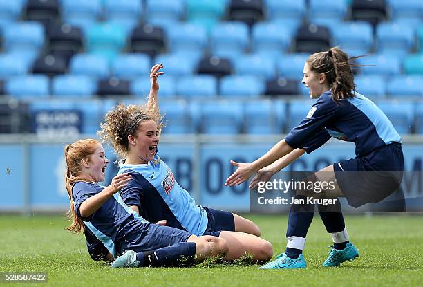 Brenna McPartlan, Ebony Stinson and Devon Hesketh of St Bede's School celebrates the win after a penalty shoot out during the Premier League U16...