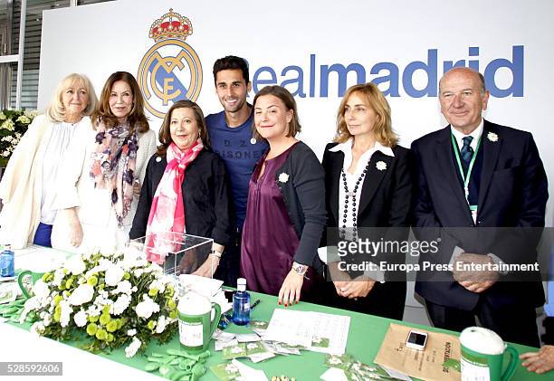 Real Madrid football player Alvaro Arbeloa, Paquita Torres and Cuchi Perez attend attends the Real Madrid Cancer Charity Table to collect funds for...