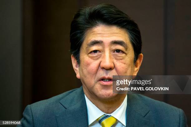 Japanese Prime Minister Shinzo Abe attends a meeting with Russian President at the Bocharov Ruchei state residence in Sochi on May 6, 2016.