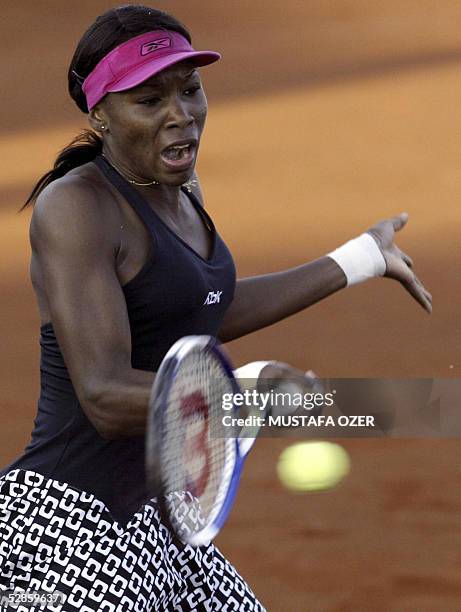 Tennis player Venus Williams returns a shot to Spanish Marta Marrero in their match of the WTA Tournament Istanbul Cup in Istanbul, 17 May 2005....