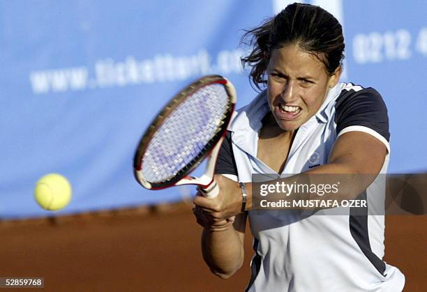 Spain's tennis player Marta Marrero returns a shot to US Venus Williams during their match at the WTA Tournament Istanbul Cup in Istanbul, 17 May...