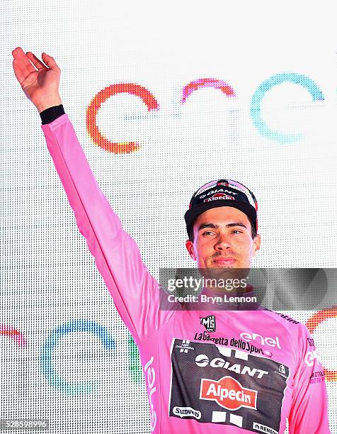 Tom Dumoulin of The Netherlands and Team Giant - Alpecin celebrates on the podium after winning stage one of the 2016 Giro, a 9.8km individual...