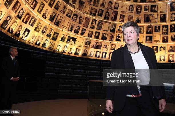 Secretary of Homeland Security, Janet Napolitano, looks at pictures of Jewish Holocaust victims at the Hall of Names during her visit to the Yad...