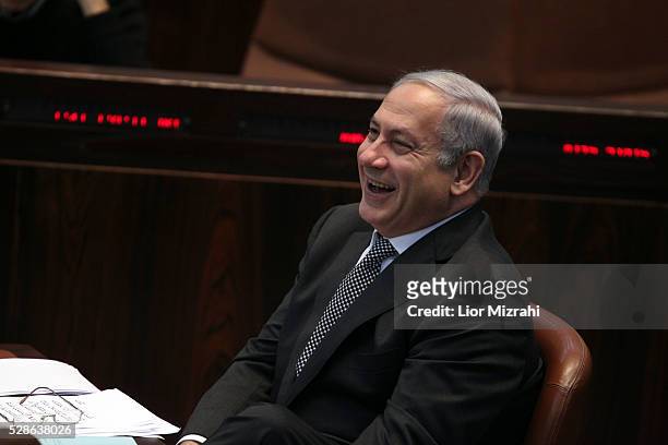Israeli Prime Minister Benjamin Netanyahu laughs in the Knesset, Israeli Parliament on January 04, 2011 in Jerusalem, Israel.
