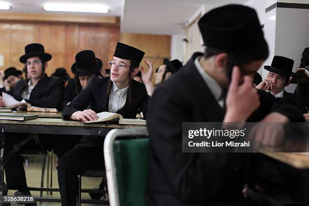 Ultra Orthodox Jewish children study in Belz synagogue on April 14, 2011 in Jerusalem, Israel.