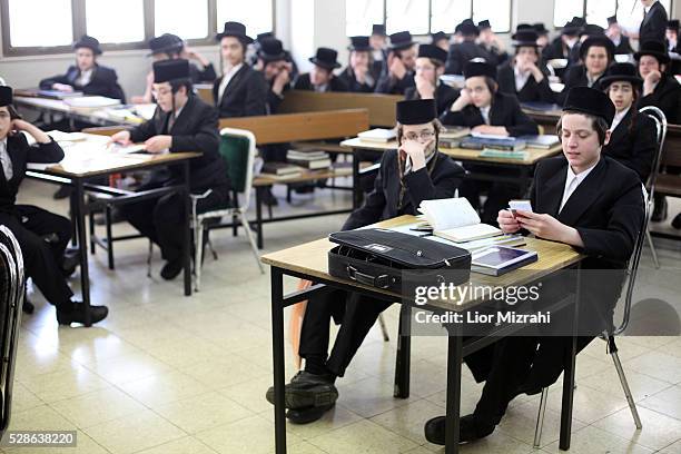 Ultra Orthodox Jewish children study in Belz synagogue on April 14, 2011 in Jerusalem, Israel.