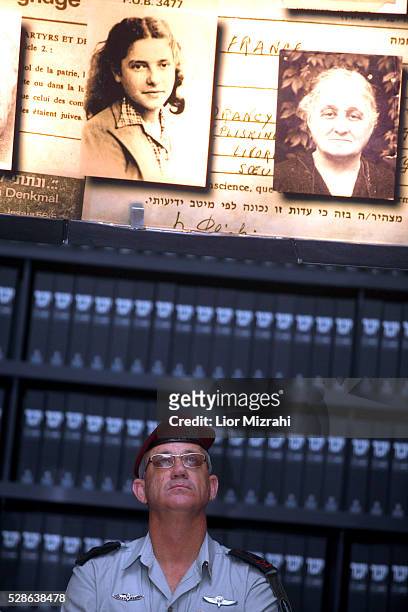 Israeli Chief of Staff General Benny Gantz looks at pictures of Jewish Holocaust victims at the Hall of Names during his visit to the Yad Vashem...