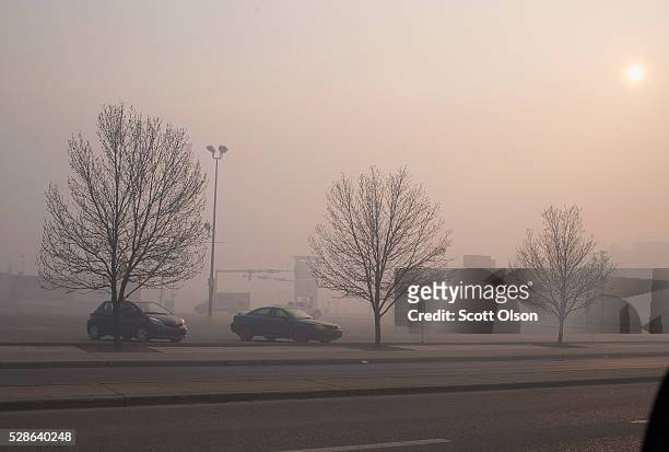 Smoke from wildfires fill the morning air on May 6, 2016 in Fort McMurray, Alberta, Canada. Wildfires, which are still burning out of control, have...