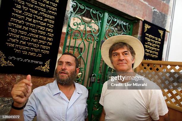 Mehmet Oz , cardiothoracic surgeon and television personality is seen during a visit at the Cave of the Patriarchs on July 29, 2013 in Hebron, West...